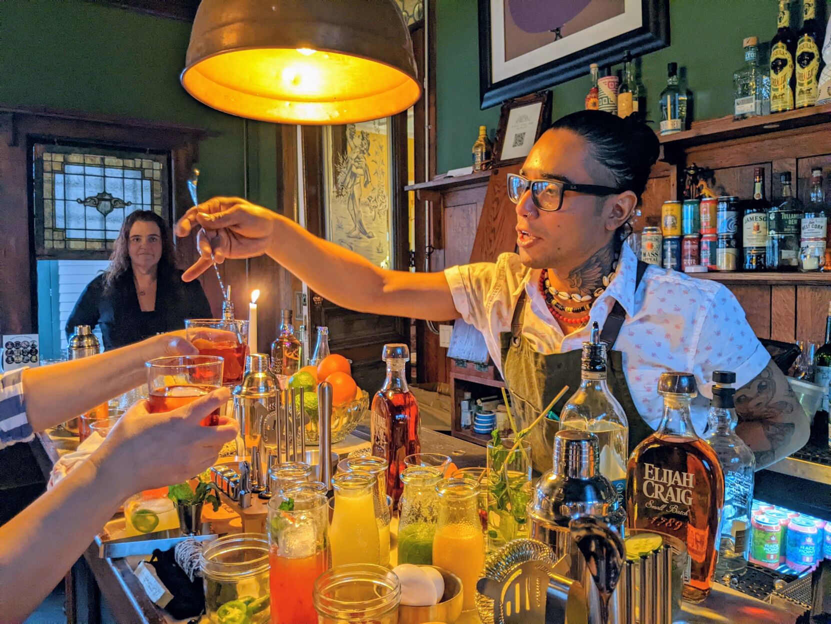 Man stirs drinks